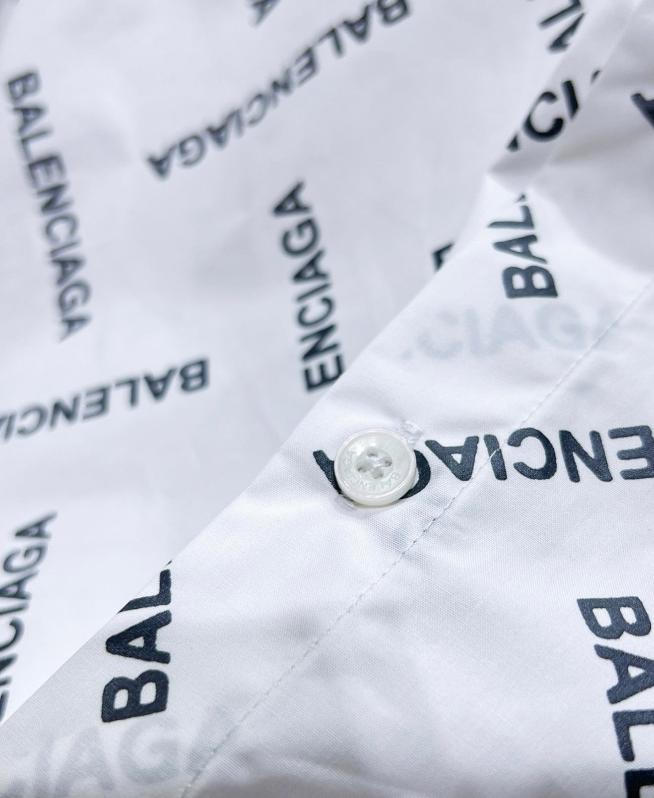 Balenciaga All-Over Logo Button-Up Shirt – Black or White